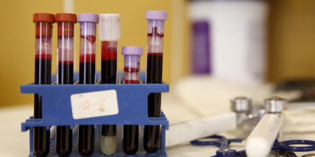 Testing tubes full of blood are seen at the American Red Cross Charles Drew Donation Center in Washington February 16, 2016. To match HEALTH-ZIKA/BLOOD REUTERS/Gary Cameron