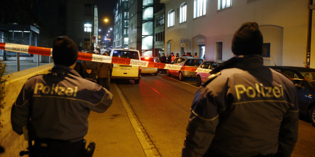 Police stand outside an Islamic center in central Zurich, Switzerland December 19, 2016. REUTERS/Arnd Wiegmann