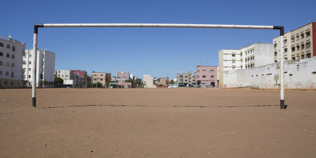 A soccer goalpost stands in a field in Rabat June 3, 2014. The 2014 Brazil World Cup opens on June 12 and fans around the globe are gearing up for the big tournament. But soccer lovers are not only preparing to watch the world's best professional players battle it out on the pitch; they are also out there kicking a ball about themselves. Reuters photographers on every continent, in countries from China to the Czech Republic, went out to capture images of soccer goalposts used by players to pract