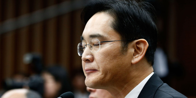 SEOUL, SOUTH KOREA - DECEMBER 06: Lee Jae-Yong, vice chairman of Samsung answers questions during a parliamentary hearing of the probe in Choi Soon-sil gate at the National Assembly on December 6, 2016 in Seoul, South Korea. South Korea started the parliament hearing with leaders of nine South Korean conglomerates including Samsung, Hyundai, Lotte over the tens of millions of dollars given to foundations controlled by Ms Park's friend Choi Soon-sil, the woman at the center of the scandal. (Pho