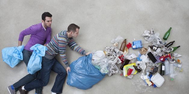 Men throwing garbage
