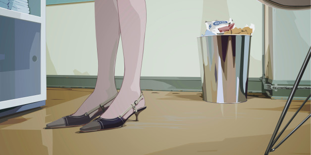 An illustration of a womans feet and lower legs standing in an office environment drawn from a low a