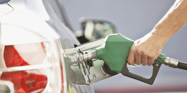Man pumping gas