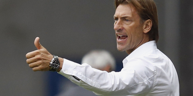FC Sochaux's coach Herve Renard reacts during their French Ligue 1 soccer match against AS Monaco at the Auguste Bonal stadium in Sochaux October 20, 2013. REUTERS/Vincent Kessler (FRANCE - Tags: SPORT SOCCER)