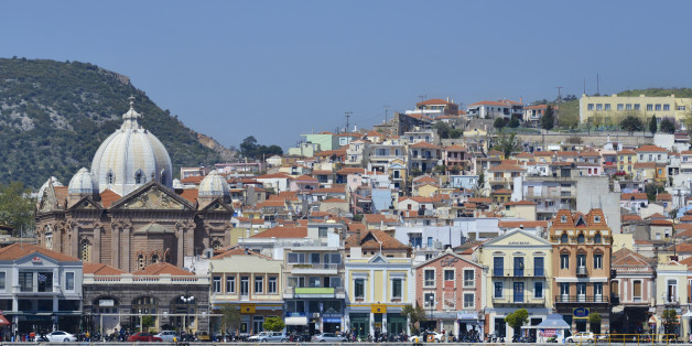 Waterfront at Mytilene town harbour. Agios Therapon church and many Neo-classical buildings. Mytilene is the main town of the Greek island of Lesvos in the North Aegean. Lesvos is the 3rd largest Greek island.
