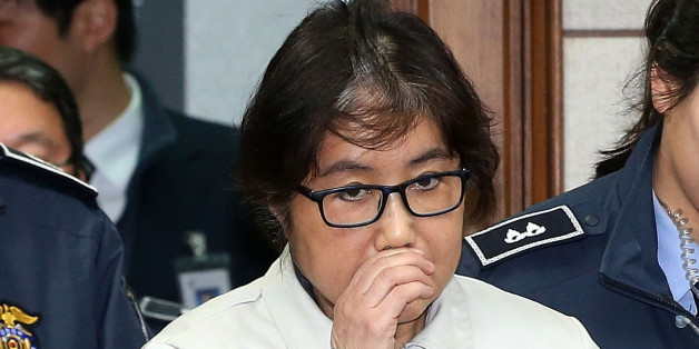 SEOUL, SOUTH KOREA - DECEMBER 19: (SOUTH KOREA OUT) Choi Soon-Sil, the jailed confidante of disgraced South Korean President Park Geun-Hye, appears for the first day of her trial at the Seoul Central District Court on December 19, 2016 in Seoul, South Korea. Choi Soon-sil, the close friend of President Park Geun-hye, who is at the center of possible corruption scandal that has been leading the president's impeachment appeared at the first court hearing. (Photo by Korea Pool via Getty Images)