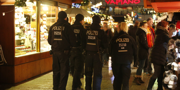 Police patrol at the re-opened Christmas market at Breitscheid square in Berlin, Germany, December 22, 2016, following an attack by a truck which ploughed through a crowd at the market on Monday night. REUTERS/Fabrizio Bensch