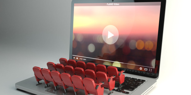 Video player app or home cinema concept. Laptop and rows of cinema seats, 3d illustration
