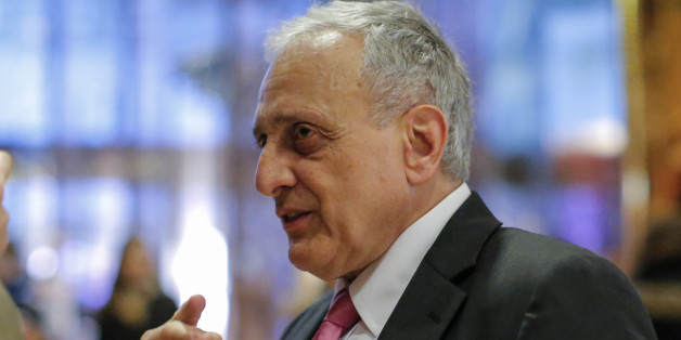 American businessman Carl Paladino speaks to the media meetings with President-elect Donald Trump at Trump Tower on December 5, 2016 in New York. / AFP / KENA BETANCUR (Photo credit should read KENA BETANCUR/AFP/Getty Images)