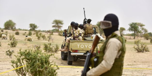 Niger Army armed forces patrol during a visit of Niger's Interior Minister to a camp for displaced populations near Diffa on June 16, 2016 following attacks by Boko Haram fighters in the region.Niger's Interior minister Mohamed Bazoum was paying a visit in Diffa today, after Boko Haram fighters on June 9 attacked a military post in Bosso in Niger's Diffa region, killing 26 soldiers including two from neighbouring Nigeria, in one of its deadliest attacks in Niger. / AFP / ISSOUF SANOGO (Ph