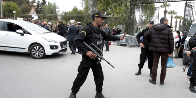 A police officer stands guard in front of the Bardo Museum in Tunis March 24, 2015. The national museum reopened on Tuesday, almost a week after a militant attack which killed 20 foreign visitors. REUTERS/Zoubeir Souissi
