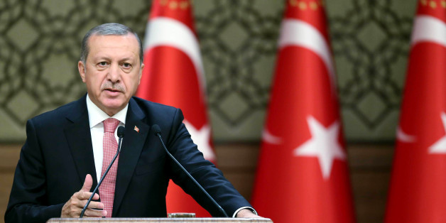 Turkish President Recep Tayyip Erdogan delivers a speech during an economic meeting with international investors at the Presidential Complex in Ankara on August 02, 2016.
President Recep Tayyip Erdogan on August 2, 2016, launched his most bitter attack yet on Turkey's Western allies over the July 15 attempted putsch, accusing them of supporting both 'terror' and the coup plotters who tried to unseat him. Turkey meanwhile issued arrest warrants for about 100 staff, including doctors, at Ankara's main military hospital, in a new phase of the crackdown after the failed coup that has seen some 18,000 detained and caused international consternation.
/ AFP / TURKEY'S PRESIDENTIAL PRESS SERVICE / KAYHAN OZER (Photo credit should read KAYHAN OZER/AFP/Getty Images)