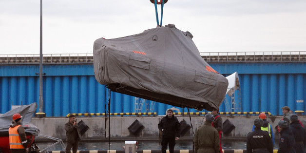 SOCHI, RUSSIA - DECEMBER 26: Specialists unload submersibles for underwater search, after Russian military Tu-154 crashed into the Black Sea, at a port of the Black Sea resort city of Sochi on December 26, 2016 in Sochi, Russia. Tupolev Tu-154 was carrying 92 people, including 68 members of the Alexandrov Ensemble, the official choir of the Russian Armed Forces, previously known as the Red Army Choir, nine journalists, and eight crew, as well as several servicemen. One of the people aboard was a famous Russian human rights activist, Yelizaveta Glinka (known as Doctor Liza). The plane crashed en route to Syria where the band had been going to perform during the New Year concert. (Photo by Dmitry Korotayev/Kommersant via Getty Images)