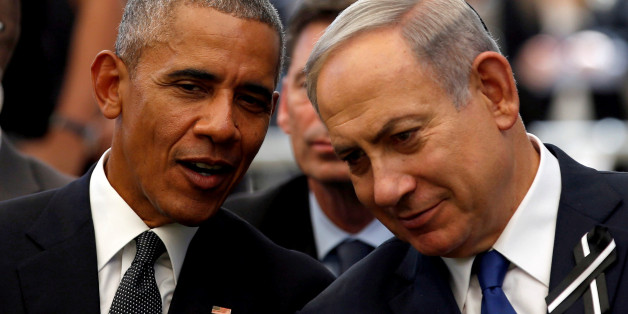 U.S. President Barack Obama (L) speaks to Israeli Prime Minister Benjamin Netanyahu during the burial ceremony of former Israeli President Shimon Peres at Mount Herzl Cemetery in Jerusalem September 30, 2016. REUTERS/Ronen Zvulun