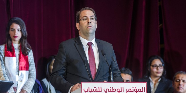 TUNIS, TUNISIA - DECEMBER 28: Tunisian Prime Minister Youssef Chahed gives a speech during the National Youht Congress at Conference Palace in Tunis, Tunisia on December 28, 2016. (Photo by Amine Landoulsi/Anadolu Agency/Getty Images)