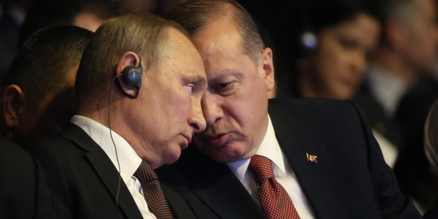 ISTANBUL, TURKEY- OCTOBER 10: (RUSSIA OUT) Russian President Vladimir Putin (L) listens to Turkish President Recep Tayip Erdogan (R) during the 23rd World Energy Congress on October 10, 2016 in Istanbul,Turkey. Putin is on a day-long visit to Turkey. (Photo by Mikhail Svetlov/Getty Images)