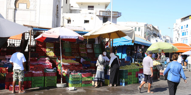 Women buy vegetables on a street market at square Sidi El Bechir in the old city in Tunis, Tunisia, August 9, 2016. Picture taken August 9, 2016. REUTERS/Zoubeir Souissi