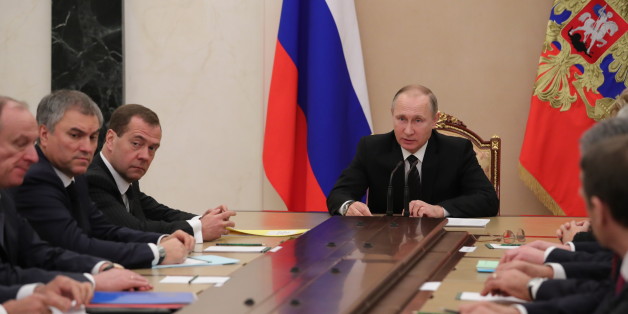 MOSCOW, RUSSIA - DECEMBER 28, 2016: Russia's President Vladimir Putin (C) chairs a meeting of the Russian Security Council at the Moscow Kremlin. Mikhail Klimentyev/Russian Presidential Press and Information Office/TASS (Photo by Mikhail Klimentyev\TASS via Getty Images)