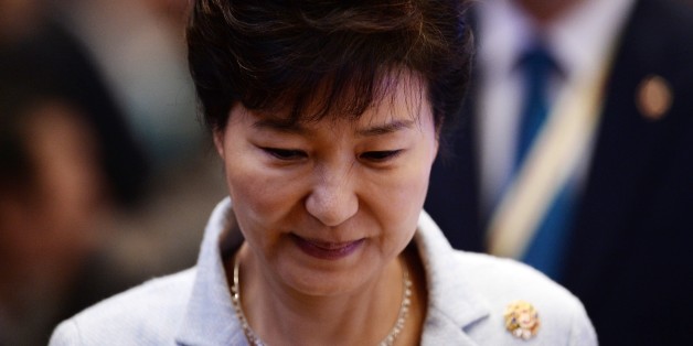 South Korean President Park Geun-hye attends the 17th ASEAN- Republic of Korea meeting during the 27th Association of Southeast Asian Nations ( ASEAN ) Summit at the Kuala Lumpur on November 22, 2015. Southeast Asian leaders November 22 symbolically declared the establishment by year-end of an EU-style regional economic bloc, but diplomats admitted it will be years before the vision of a single market can be realised. AFP PHOTO / MANAN VATSYAYANA (Photo credit should read MANAN VATSYAY