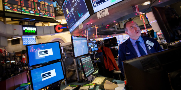 A trader works on the floor of the New York Stock Exchange (NYSE) in New York, U.S., on Monday, Dec. 12, 2016. U.S. stocks were little changed as a sharp rally in oil prices boosted shares in energy companies, offsetting losses in industrial and consumer discretionary shares. Photographer: Michael Nagle/Bloomberg via Getty Images