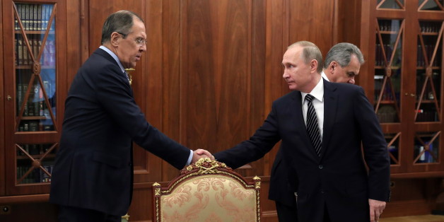 MOSCOW, RUSSIA - DECEMBER 29, 2016: Russia's President Vladimir Putin (R front) holds a meeting with Russia's Foreign Minister Sergei Lavrov (L) and Russia's Defence Minister Sergei Shoigu at the Moscow Kremlin. Mikhail Klimentyev/Russian Presidential Press and Information Office/TASS (Photo by Mikhail Klimentyev\TASS via Getty Images)