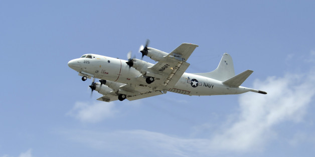 Kaneohe, Hawaii, July 14, 2012 - A P-3C Orion aircraft takes off from Marine Corps Base Hawaii to conduct a maverick missile strike exercise mission on a target at sea during Rim of the Pacific (RIMPAC) 2012.