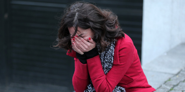 A former employee of the Reina nightclub reacts outside following an attack by a gunman in Istanbul, Turkey, January 1, 2017. REUTERS/Huseyin Aldemir