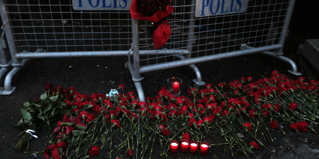 Flowers are placed near the entrance of Reina nightclub by the Bosphorus, which was attacked by a gunman, in Istanbul, Turkey, January 1, 2017. REUTERS/Huseyin Aldemir