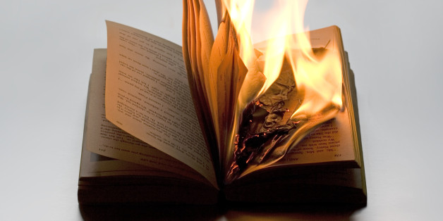 Burning book on white background. It refers to disregard for wisdom, history and knowledge. It points out to Fascist movement. It can refer to anarchy and punk.