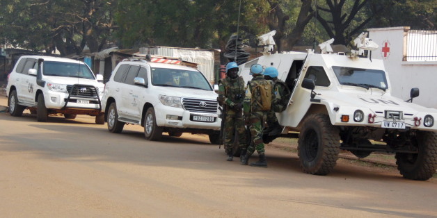 U.N. peacekeepers take a break as they patrol along a street during the presidential election in Bangui, the capital of Central African Republic, December 30, 2015. REUTERS/Media Coulibaly