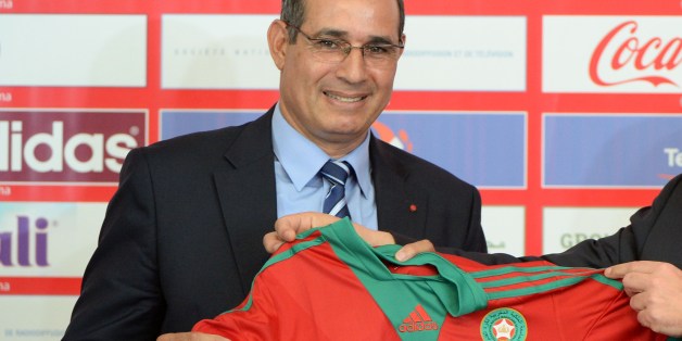 Morocco's Atlas Lions newly appointed coach Badou Zaki poses with the national jersey on May 2, 2014 during a press conference in Rabat. AFP PHOTO / FADEL SENNA (Photo credit should read FADEL SENNA/AFP/Getty Images)