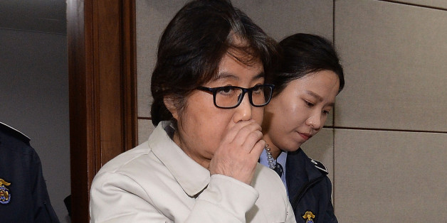 SEOUL, SOUTH KOREA - DECEMBER 19: (SOUTH KOREA OUT) Choi Soon-Sil, the jailed confidante of disgraced South Korean President Park Geun-Hye, appears for the first day of her trial at the Seoul Central District Court on December 19, 2016 in Seoul, South Korea. Choi Soon-sil, the close friend of President Park Geun-hye, who is at the center of possible corruption scandal that has been leading the president's impeachment appeared at the first court hearing. (Photo by Korea Pool via Getty Images)