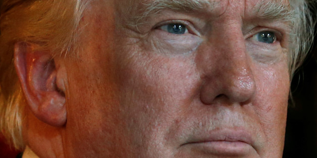 U.S. President-elect Donald Trump speaks briefly to reporters between meetings at the Mar-a-lago Club in Palm Beach, Florida, U.S. December 28, 2016. REUTERS/Jonathan Ernst