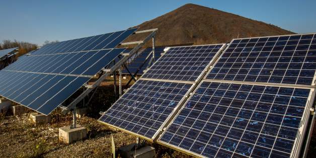 A picture shows solar panels installed at the Lumiwatt site, a site of research and testing on photovoltaic panels, in Loos-en-Gohelle, northern France, on November 25, 2016. / AFP / PHILIPPE HUGUEN (Photo credit should read PHILIPPE HUGUEN/AFP/Getty Images)