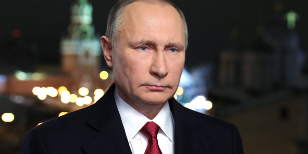 Russian President Vladimir Putin makes his New Year's address to the nation in Moscow's Kremlin, December 31, 2016. / AFP / Sputnik / Mikhail KLIMENTIEV (Photo credit should read MIKHAIL KLIMENTIEV/AFP/Getty Images)