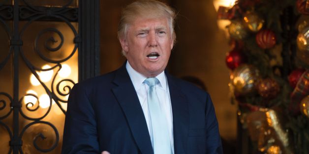 US President-elect Donald Trump answers questions from the media after a day of meetings on December 28, 2016 at Mar-a-Lago in Palm Beach, Florida. / AFP / DON EMMERT (Photo credit should read DON EMMERT/AFP/Getty Images)