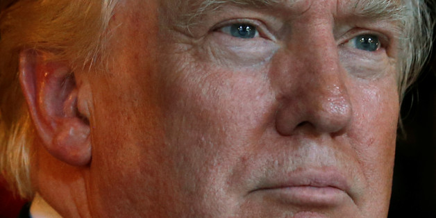 U.S. President-elect Donald Trump speaks briefly to reporters between meetings at the Mar-a-lago Club in Palm Beach, Florida, U.S. December 28, 2016. REUTERS/Jonathan Ernst