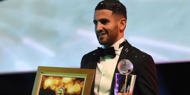 Algerian and Leicester forward Riyad Mahrez poses for a photo after being crowned African Footballer of the Year in Abuja, on January 5, 2017. Algerian and Leicester striker Riyad Mahrez has been crowned the CAF African best Footballer for 2016 and beating former best player and Gabonese forward Pierre-Emerick Aubameyang and Sehegalese striker Sadio Mane, for the continent's most prestigious individual award. / AFP / PIUS UTOMI EKPEI (Photo credit should read PIUS UTOMI EKPEI/AFP/Getty