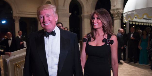 US President-elect Donald Trump arrives with his wife Melania for a New Year's Eve party December 31, 2016 at Mar-a-Lago in Palm Beach, Florida. / AFP / DON EMMERT (Photo credit should read DON EMMERT/AFP/Getty Images)