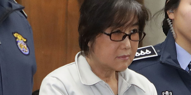 SEOUL, SOUTH KOREA - JANUARY 5: Choi Soon-sil, the jailed confidante of disgraced South Korean President Park Geun-Hye, appears for her first trial at the Seoul Central District Court on January 5, 2017 in Seoul, South Korea. Choi Soon-sil, the close friend of President Park Geun-hye, who is at the center of possible corruption scandal that has been leading the president's impeachment appeared at the court hearing. (Photo by Chung Sung-Jun/Getty Images)