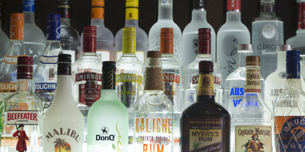 US, New York, Various bottles of US and international spirits in bar on 8th avenue.