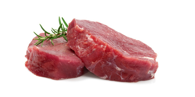 Two Raw Steaks Isolated on White