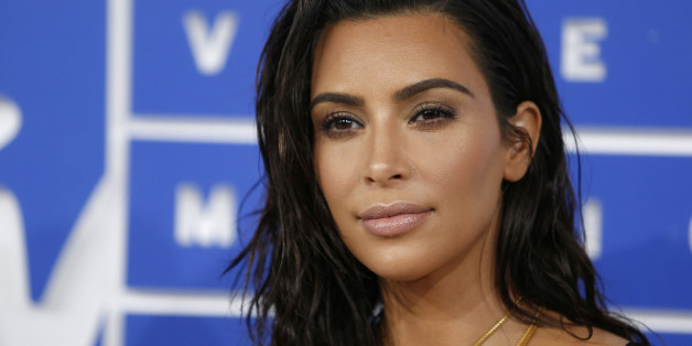 FILE PHOTO: Kim Kardashian arrives at the 2016 MTV Video Music Awards in New York, U.S., August 28, 2016. REUTERS/Eduardo Munoz/File photo