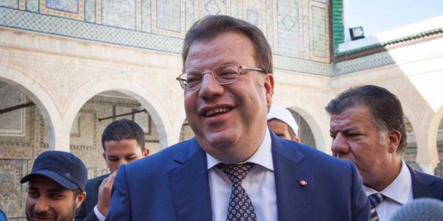 KAIROUAN, TUNISIA - NOVEMBER 14: Tunisian independent presidential candidate Mohamed Frikha, head of Ennahdha's list in the district Sfax 2, visits Kairouan city in Tunisia as part of his electoral campaign on November 14, 2014. (Photo by Marieau Palacio/Anadolu Agency/Getty Images)