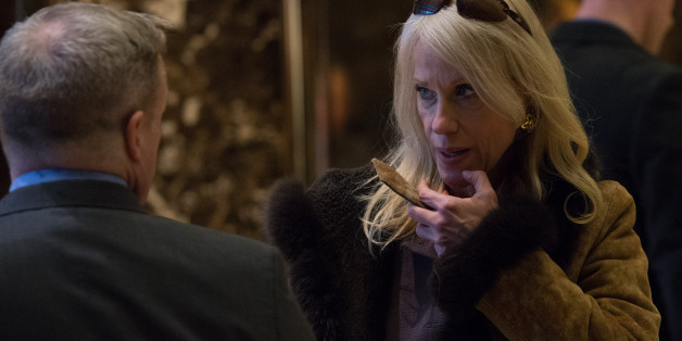 Sean Spicer and Kellyanne Conway speak in the lobby at Trump Tower in New York on January 10, 2017. / AFP / Bryan R. Smith (Photo credit should read BRYAN R. SMITH/AFP/Getty Images)