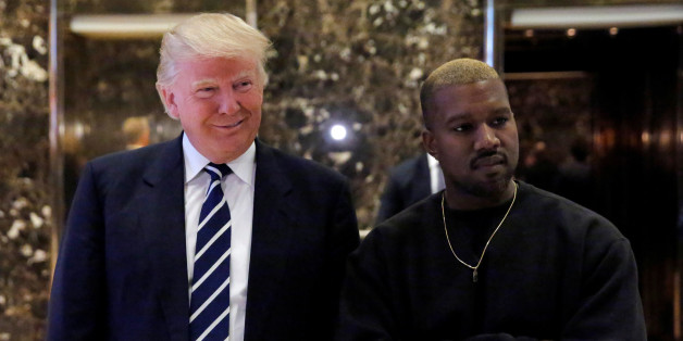 U.S. President-elect Donald Trump and musician Kanye West pose for media at Trump Tower in Manhattan, New York City, U.S., December 13, 2016. REUTERS/Andrew Kelly