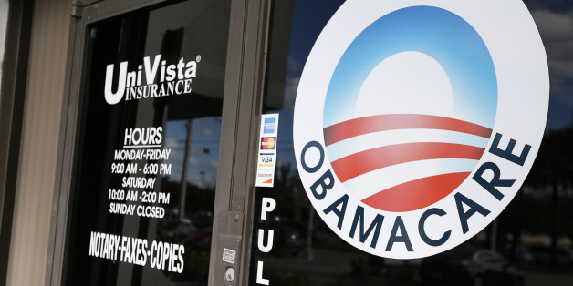 An Obamacare logo is shown on the door of the UniVista Insurance agency in Miami, Florida on January 10, 2017.
As President-elect Donald Trump's administration prepares to take over Washington, they have made it clear that overturning and replacing the Affordable Care Act is a priority. / AFP / RHONA WISE (Photo credit should read RHONA WISE/AFP/Getty Images)