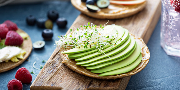Wholegrain toast with variety of healthy toppings