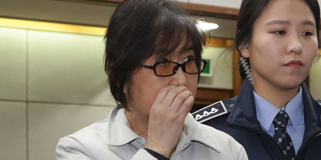 SEOUL, SOUTH KOREA - JANUARY 05: Choi Soon-Sil, the jailed confidante of disgraced South Korean President Park Geun-Hye, appears for her first trial at the Seoul Central District Court on January 5, 2017 in Seoul, South Korea. Choi Soon-sil, the close friend of President Park Geun-hye, who is at the center of possible corruption scandal that has been leading the president's impeachment appeared at the court hearing. (Photo by Chung Sung-Jun/Getty Images)
