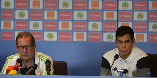 Algeria's Belgian Coach Georges Leekens and player Aissa Mandi give a press conference at Franceville stadium in Franceville on January 14, 2017, ahead of Africa Cup of Nations (CAN). / AFP / KHALED DESOUKI (Photo credit should read KHALED DESOUKI/AFP/Getty Images)